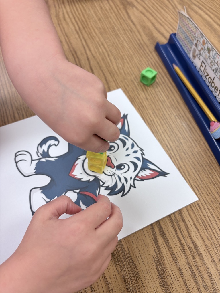 Mrs. Garlands wildcats practiced numbers 1–5 by feeding the Wildcat the correct number of cubes! 🔢🐾