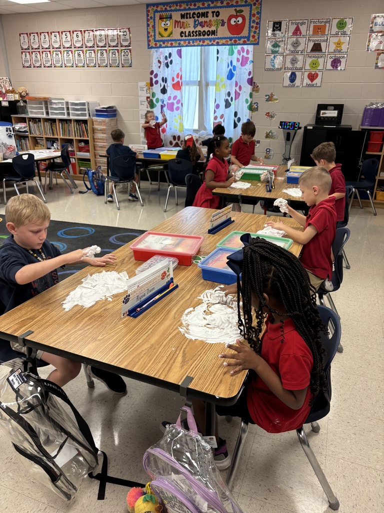🫧✏️ Spelling Words + Shaving Cream = FUN Learning! ✏️🫧 Today, our first graders in Mrs. Danzey’s class took spelling practice to a whole new level! Instead of using paper and pencils, we practiced writing our spelling words in shaving cream! 🤩 The kids had so much fun practicing their words while also strengthening their fine-motor skills and letter formation. They loved getting their hands messy while learning—and we loved seeing those little brains hard at work! 🧠✨ Learning doesn’t always have to happen at a desk. Sometimes the best learning happens when we get messy, get creative, and have FUN! 💜🐾 Way to go, first graders! You made spelling practice extra special today! ⭐