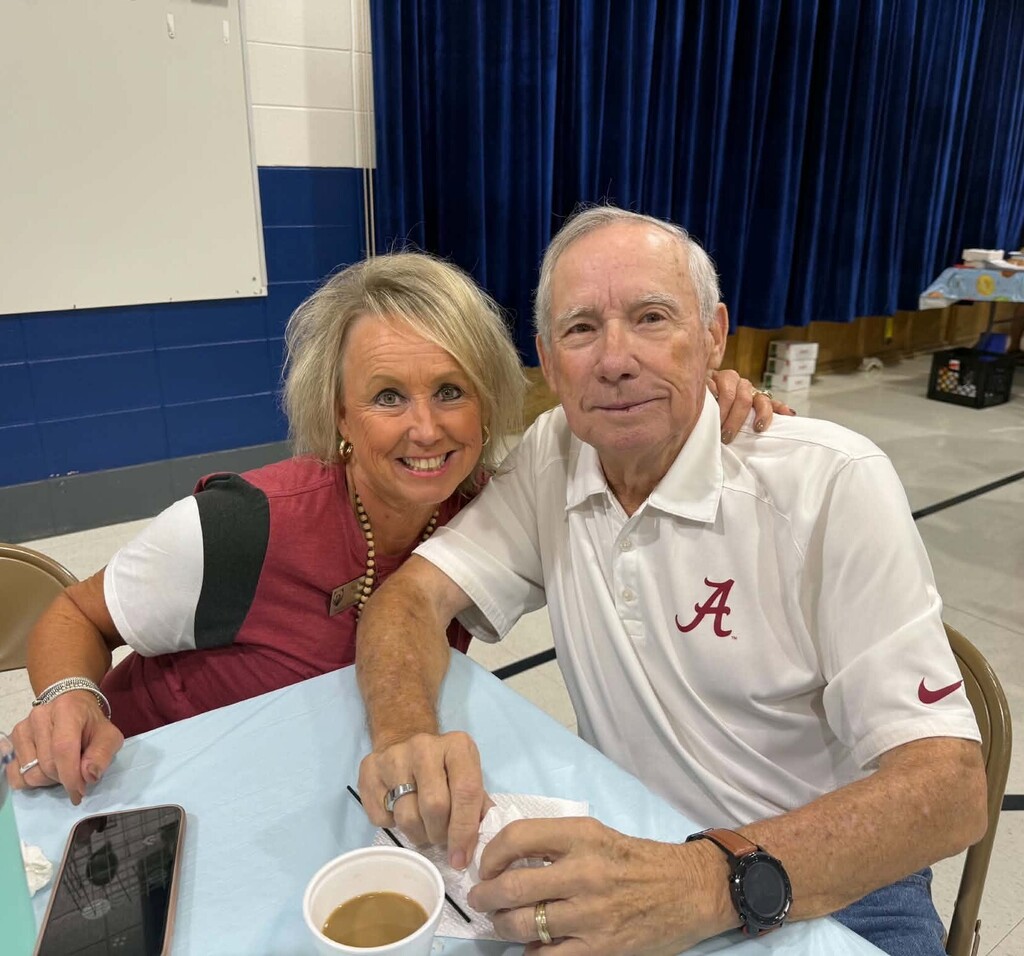 The Breitling Elementary principal and her dad in a cafeteria