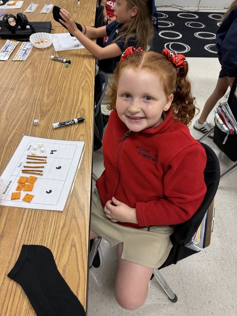 Today we made learning three-digit numbers extra fun! 🔢✨ Ms. Weaver's second graders rolled dice to build a number for each place value on their HTO (Hundreds-Tens-Ones) chart. Then we used Cheez-Its for hundreds, pretzel rods for tens, and marshmallows for ones to build/represent our numbers! 🧀🥨☁️