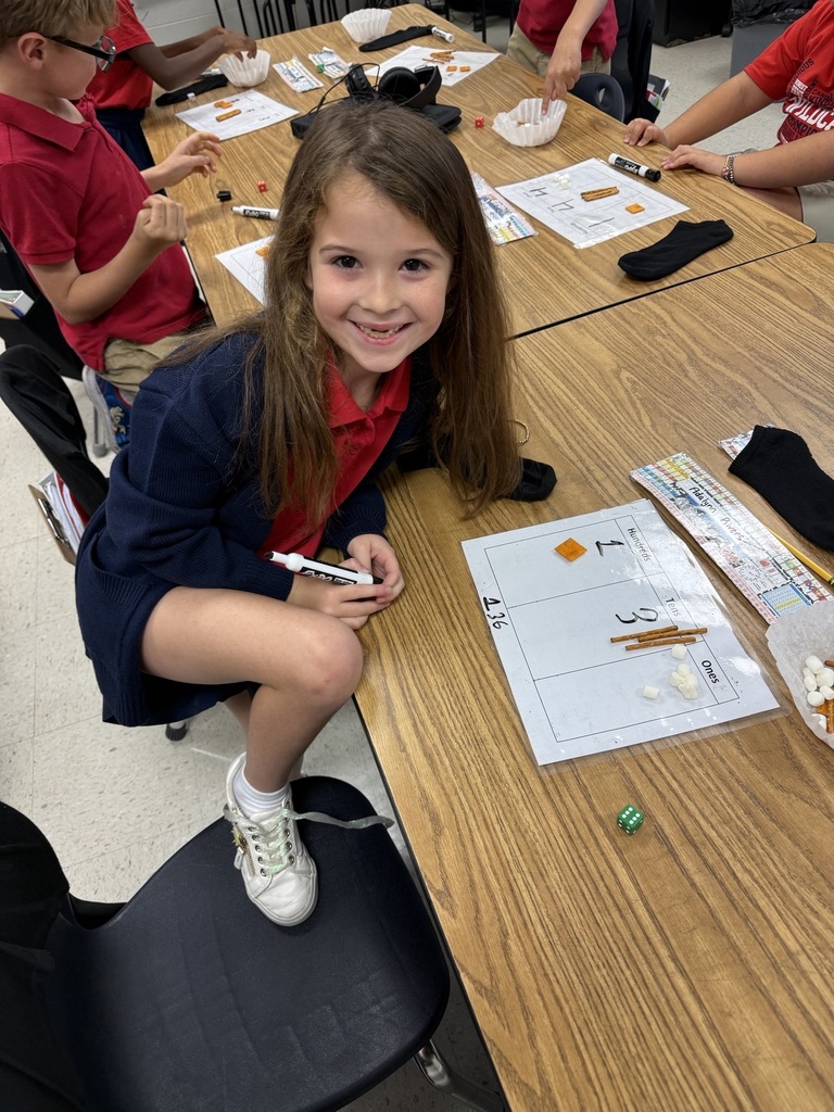 Today we made learning three-digit numbers extra fun! 🔢✨ Ms. Weaver's second graders rolled dice to build a number for each place value on their HTO (Hundreds-Tens-Ones) chart. Then we used Cheez-Its for hundreds, pretzel rods for tens, and marshmallows for ones to build/represent our numbers! 🧀🥨☁️