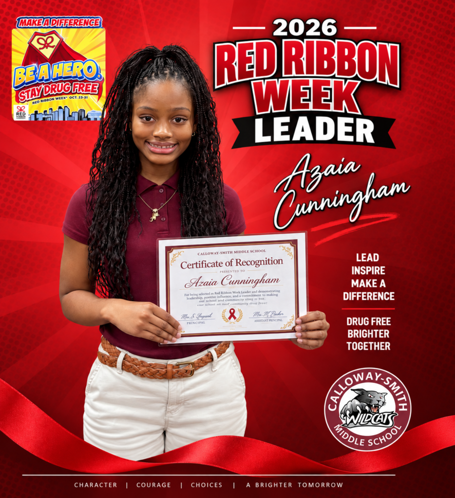 A person with curly braided hair holds a certificate. They wear a maroon shirt and khaki pants. Red background.
