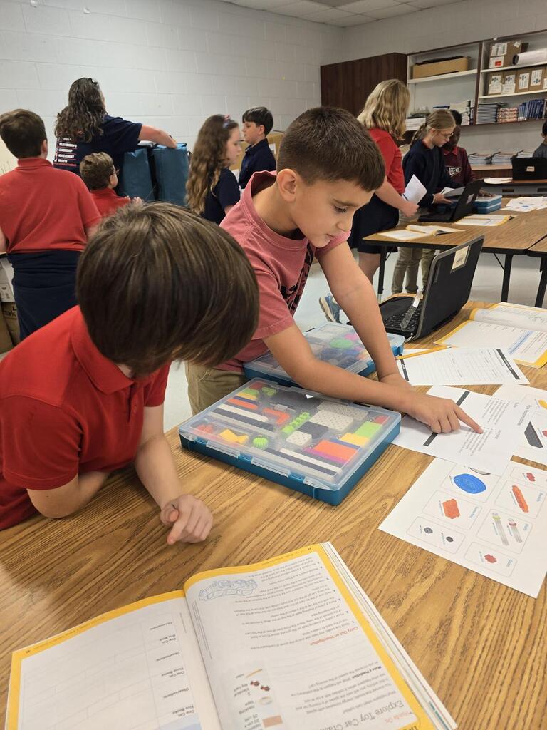 Mrs. Holland's class built equivalent mass Vex cars for part 1 of a Science investigation on collisions and inertia. Part 2 coming next week.