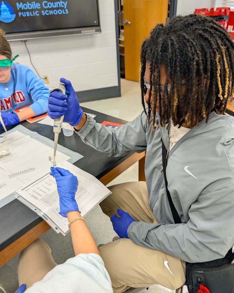 Students investigated a simulated infectious disease outbreak, using contact tracing, bioinformatics, and molecular laboratory techniques to track the spread of the illness, identify the pathogen, and determine the outbreak’s “patient zero.”