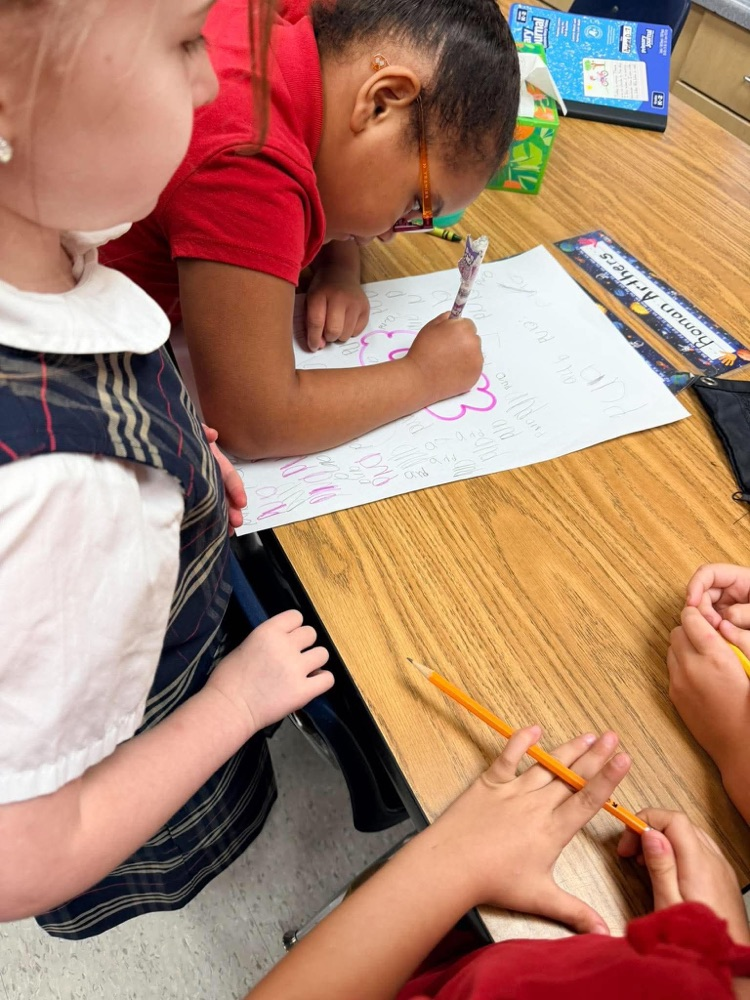 First grade playing freeze and write to review letter sounds and high frequency words: