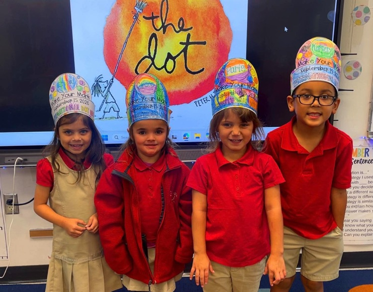 Kindergarten girls wearing the dot hats
