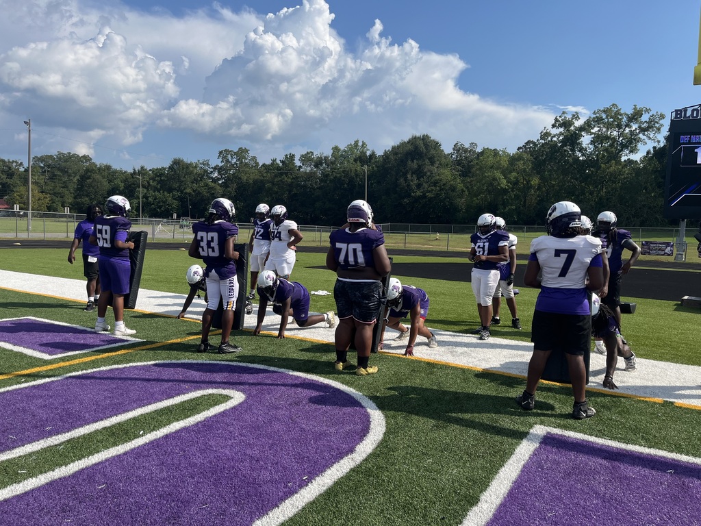 Blount football players practicing with their new tackle equipment.