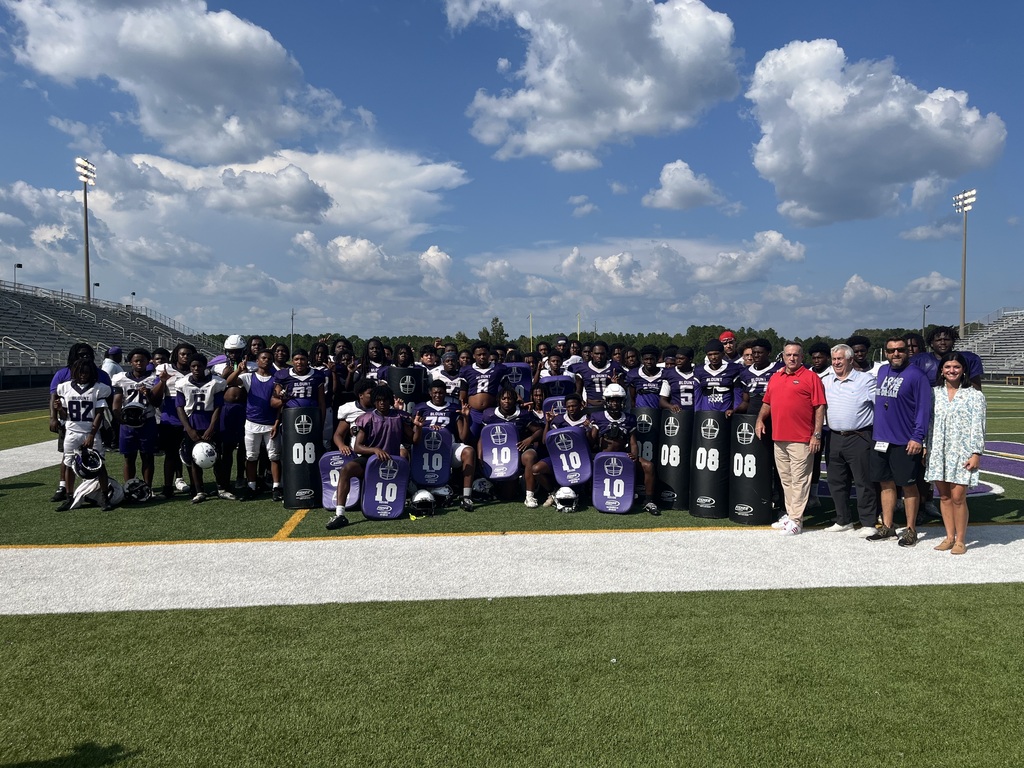 The Blount Leopards football team pictured with representative from the Senior Bowl. 