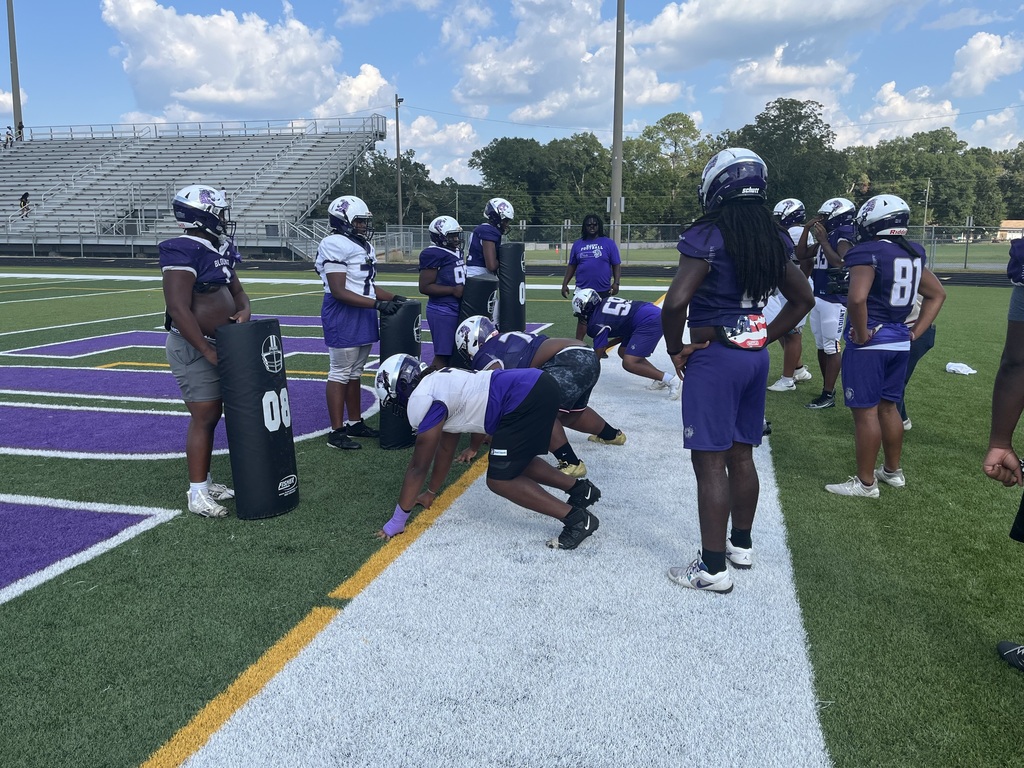 Blount football players practicing with their new tackle equipment.
