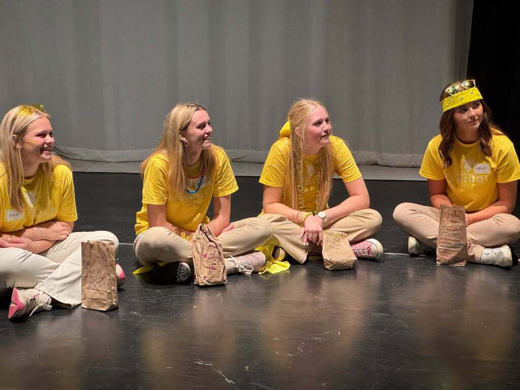 The Academy of Business Management Leadership Pathway students participate in a House Hype event.
