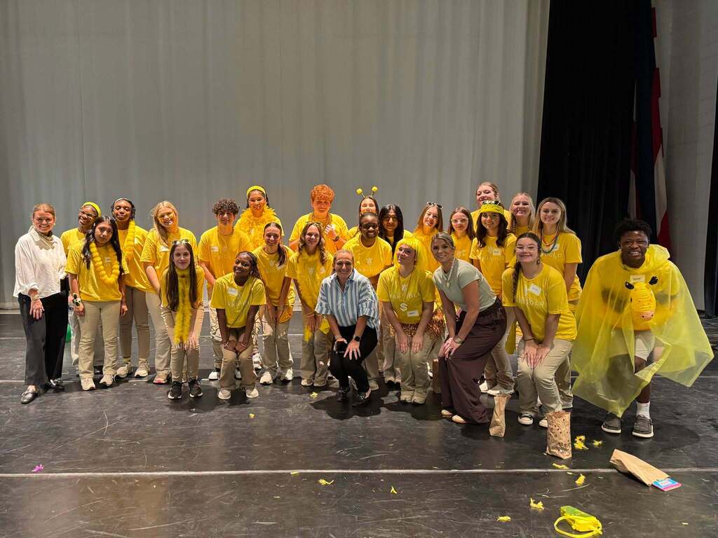 The Academy of Business Management Leadership Pathway students participate in a House Hype event.