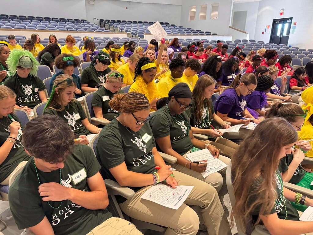 The Academy of Business Management Leadership Pathway students participate in a House Hype event.