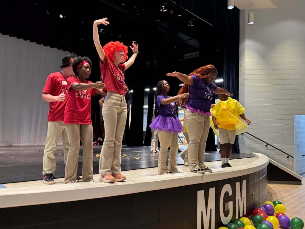 The Academy of Business Management Leadership Pathway students participate in a House Hype event.