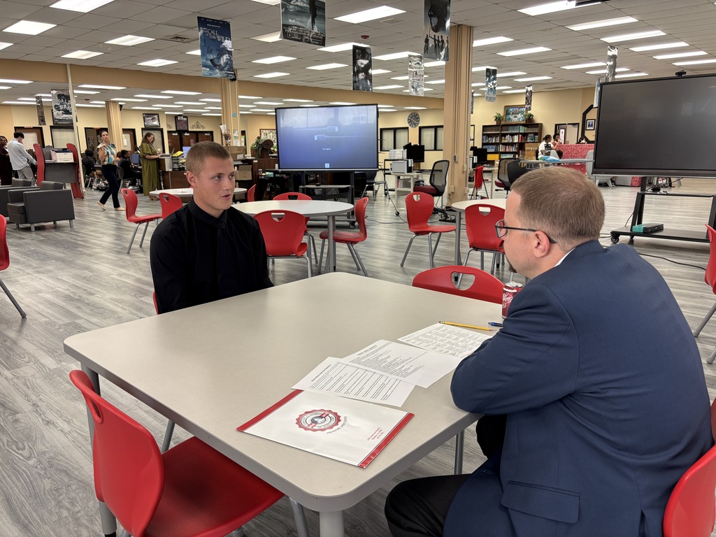 Student and interviewer at Theodore
