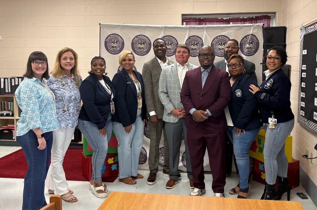 A group of city councilmen and educators