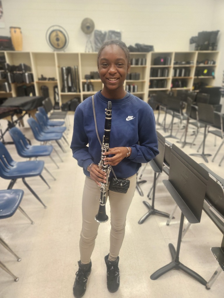 Band student with clarinet.