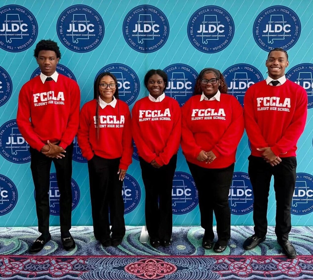 Five students in red FCCLA sweatshirts