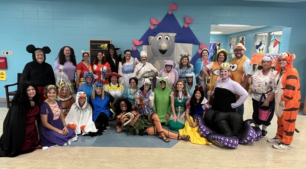 A room full of teachers in Disney-themed costumes