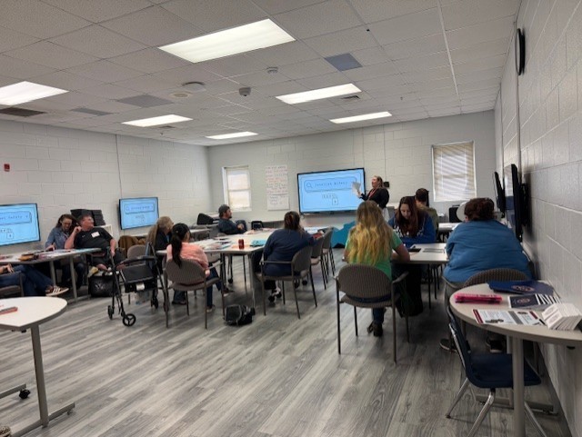 Teacher presenting to parents
