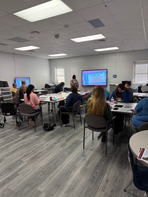 Math coach presenting to parents