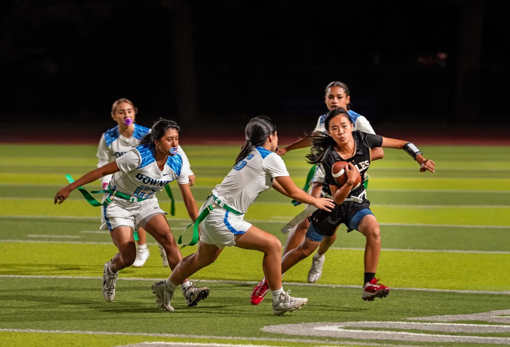 Girls playing flag football
