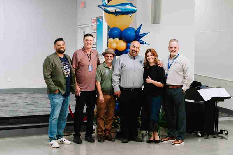 Members of Orville Wright Elementary past and present were all smiles for the ribbon cutting