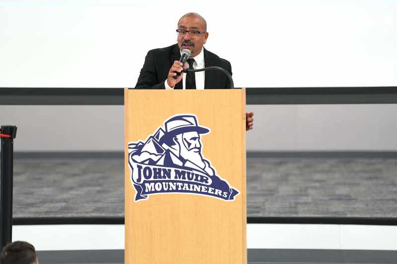 Principal Armando Medina speaks to students, staff, and families at ribbon-cutting ceremony. 