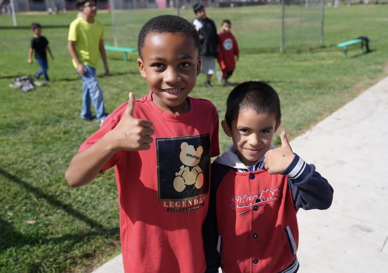 Rob Road students give the thumbs up after completing a mile run.
