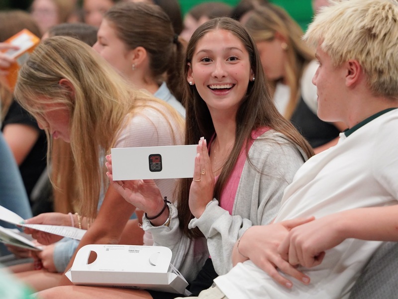 Photos of students holding their awards