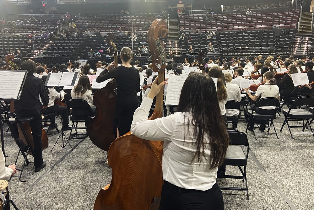 student playing in the all state orchestra