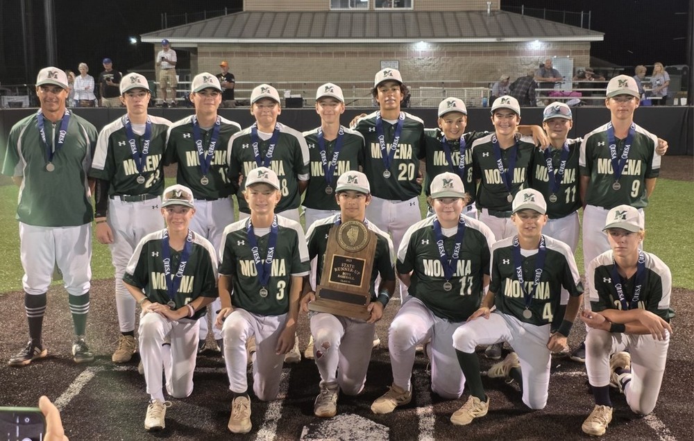 Boys baseball team with state trophy