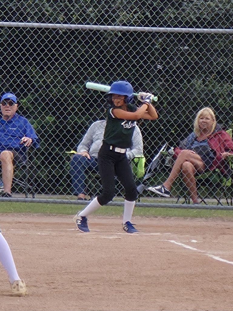 softball player playing softball
