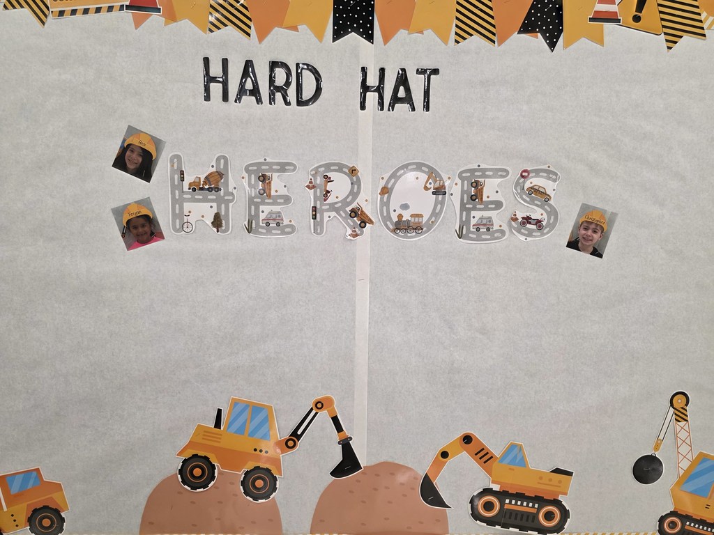 bulletin board with hard hat heroes