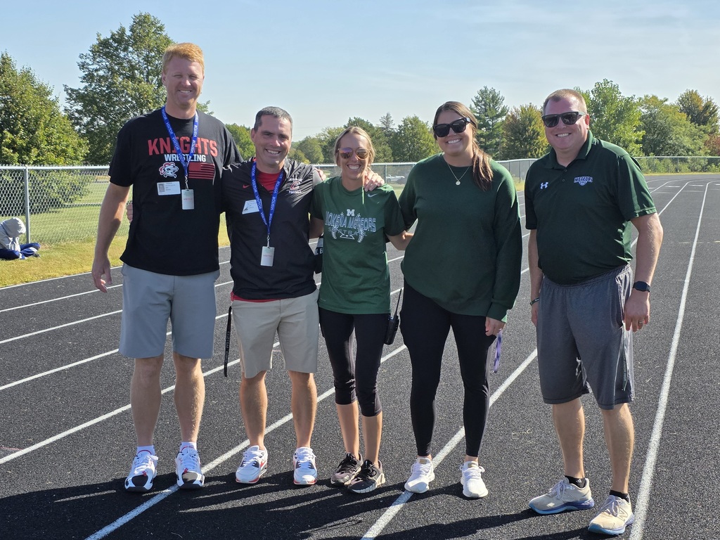pe teachers standing together