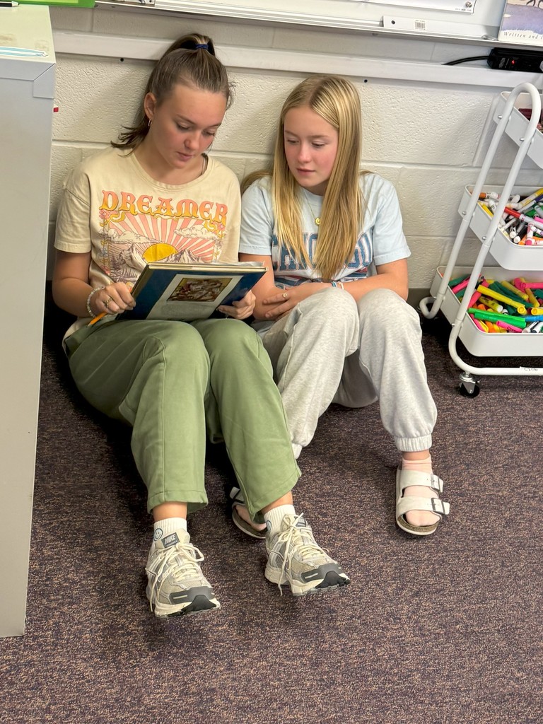 students look at writing