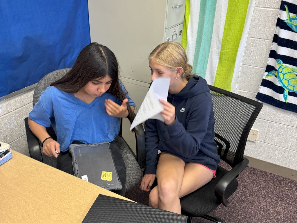 students look at writing