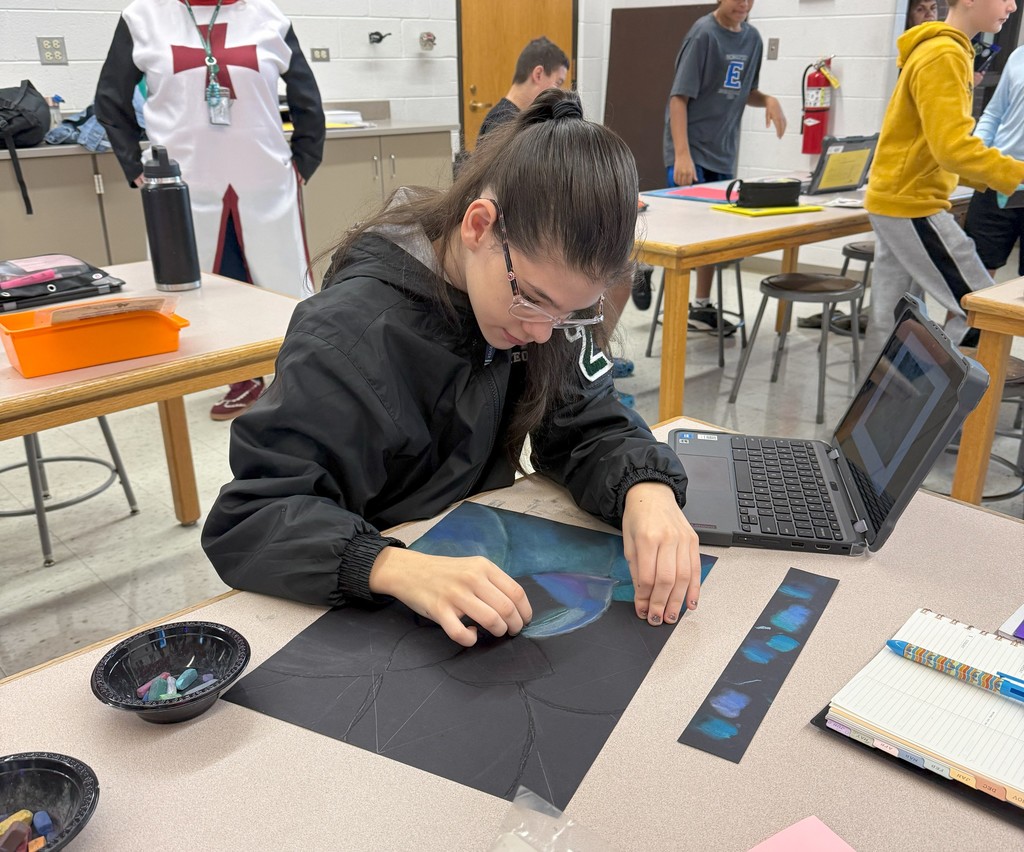 students drawing with chalk