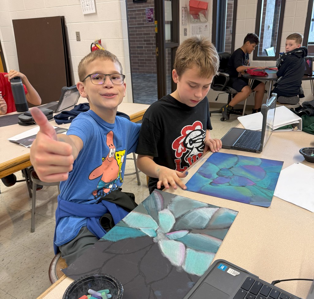 students drawing with chalk