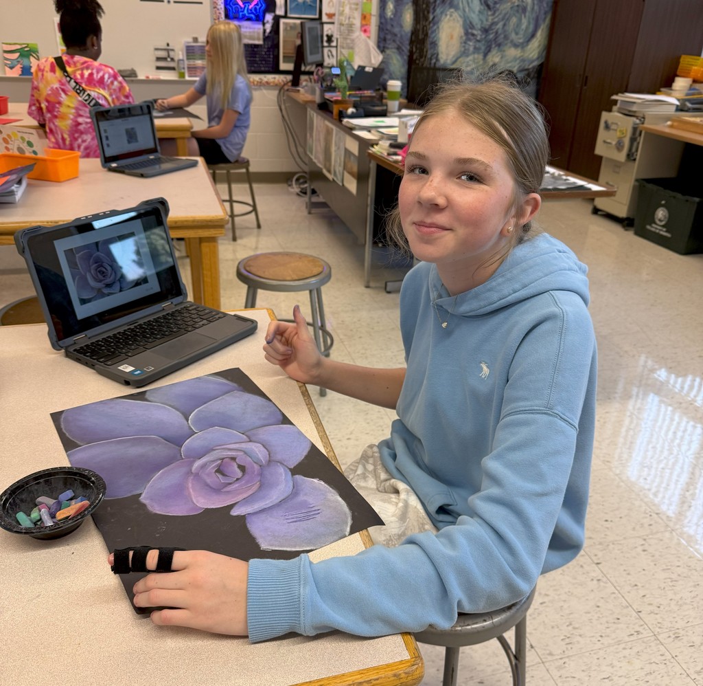 students drawing with chalk