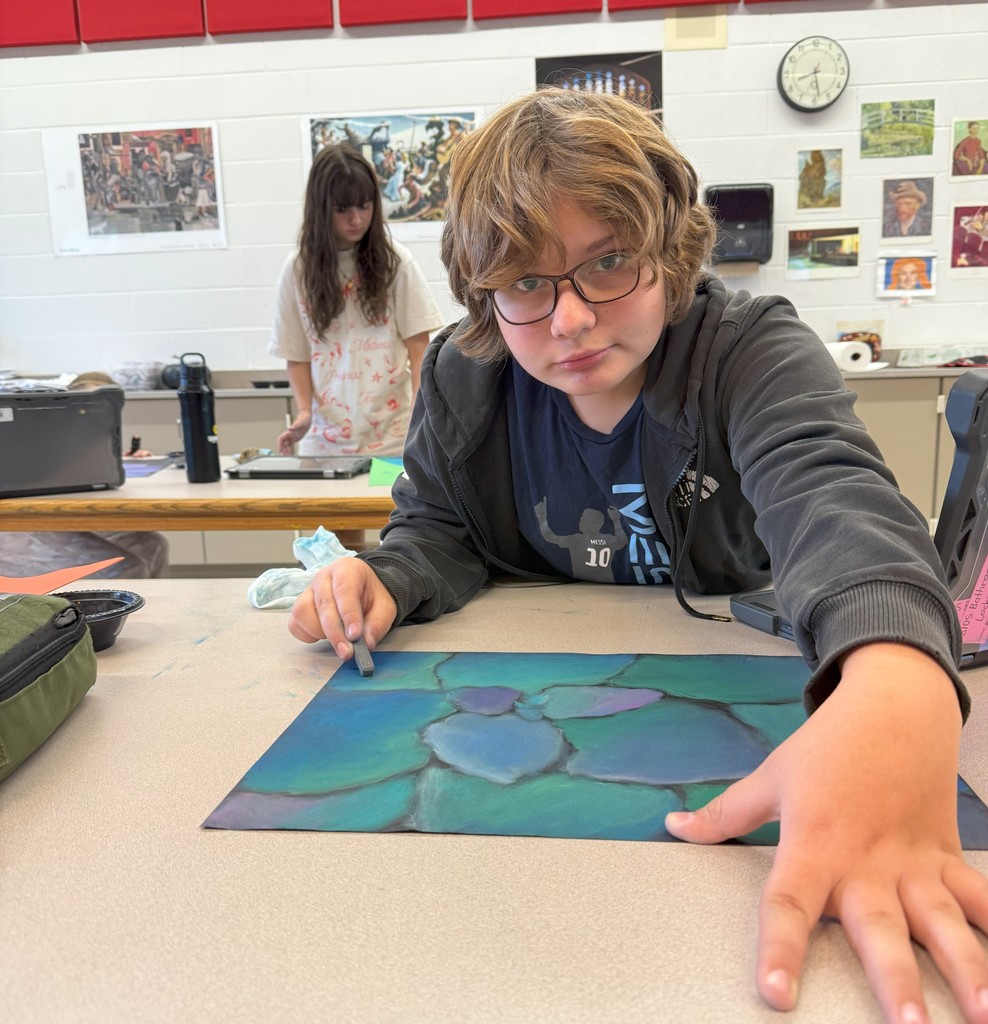 students drawing with chalk