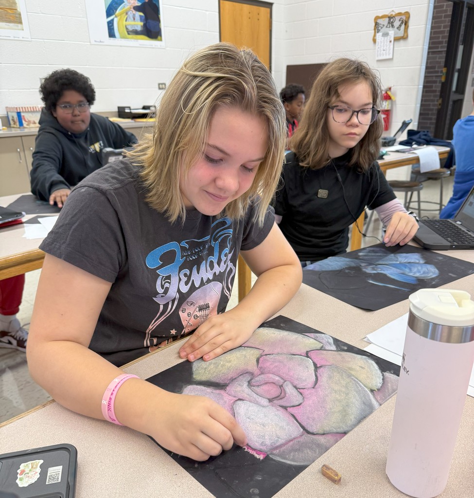 students drawing with chalk
