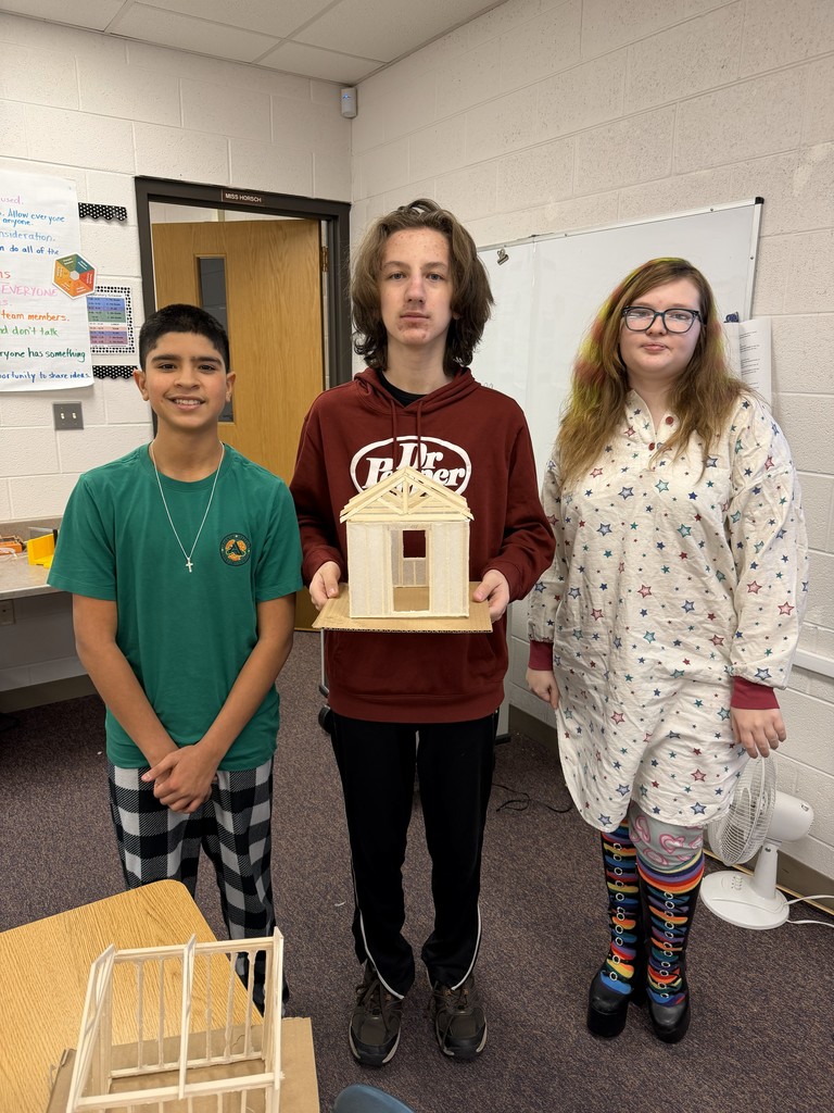students building models with wood and glue