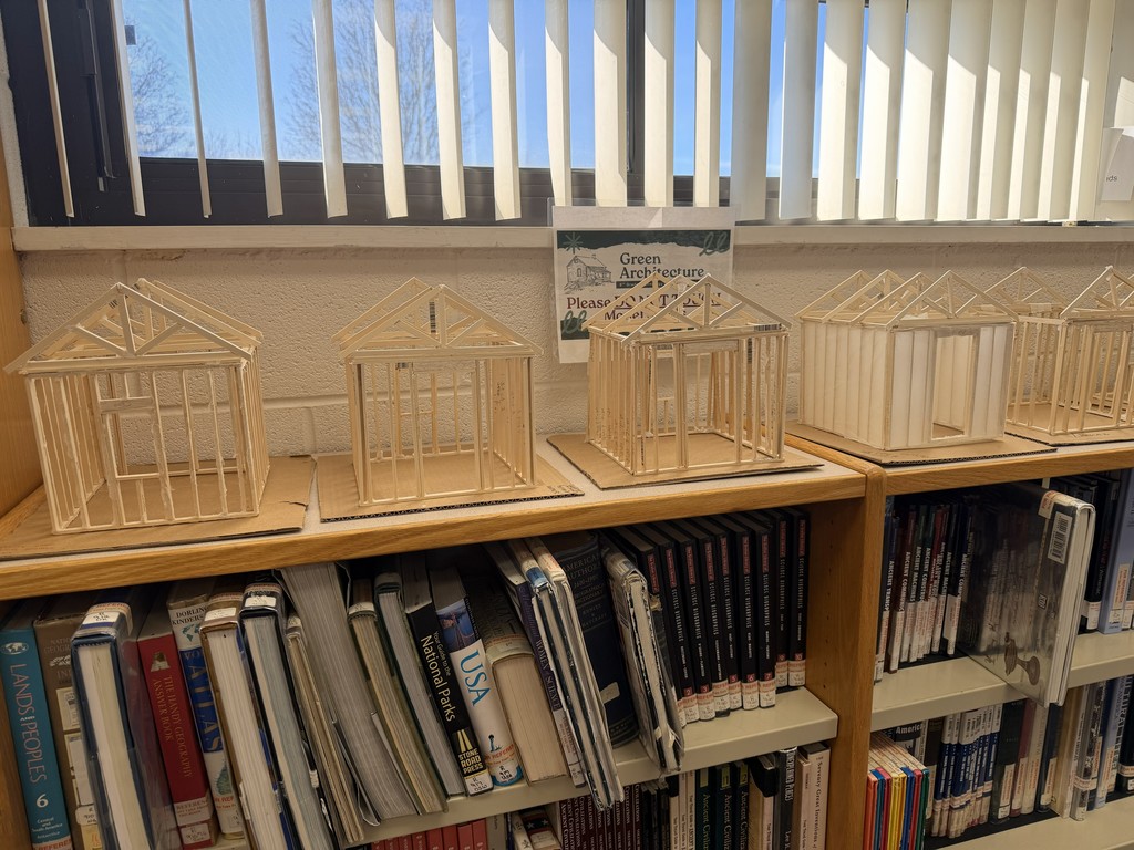 students building models with wood and glue