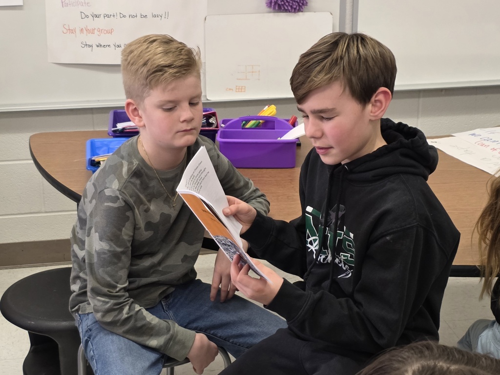 4th graders reading to 3rd graders