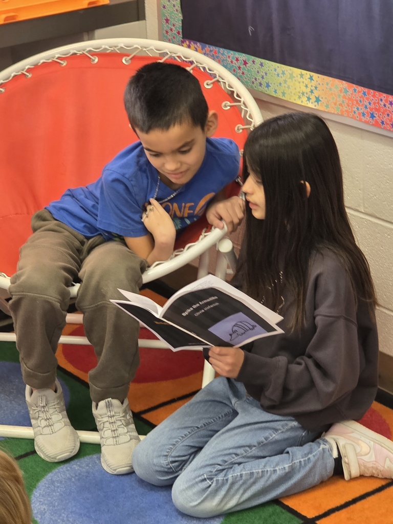 4th graders reading to 3rd graders