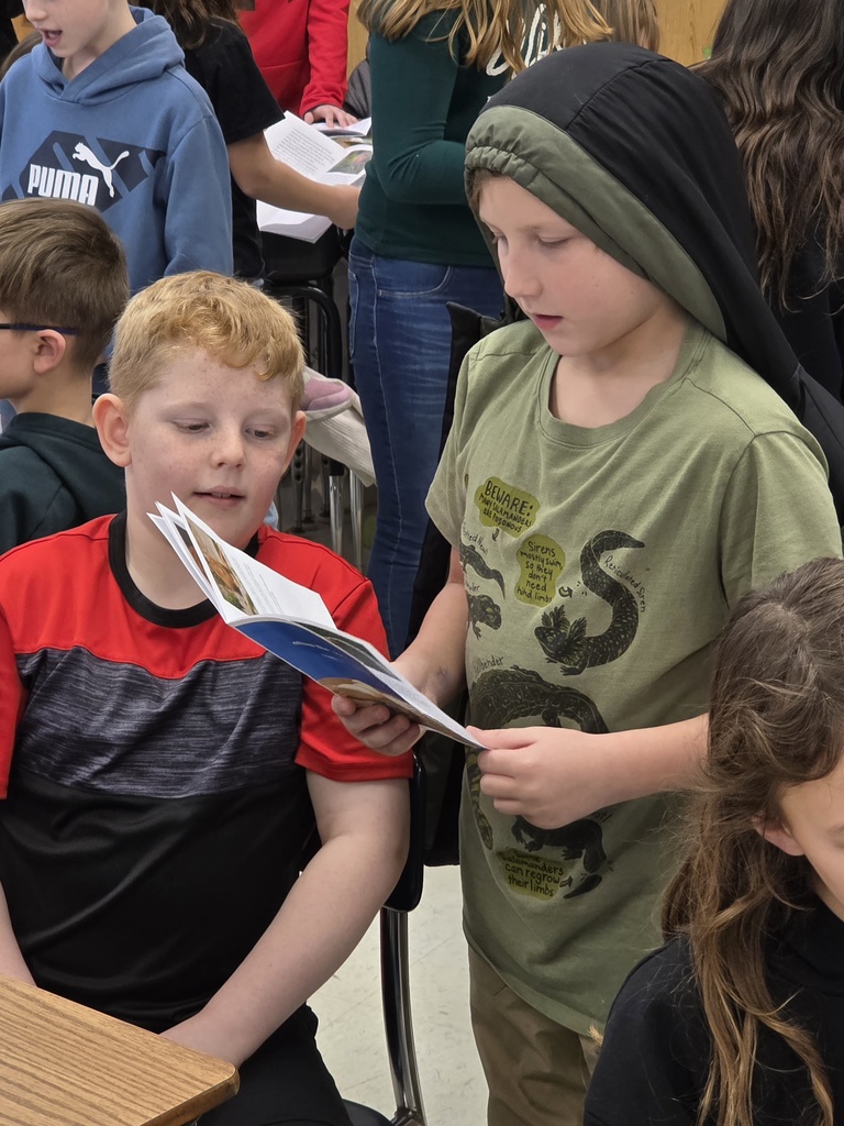 4th graders reading to 3rd graders