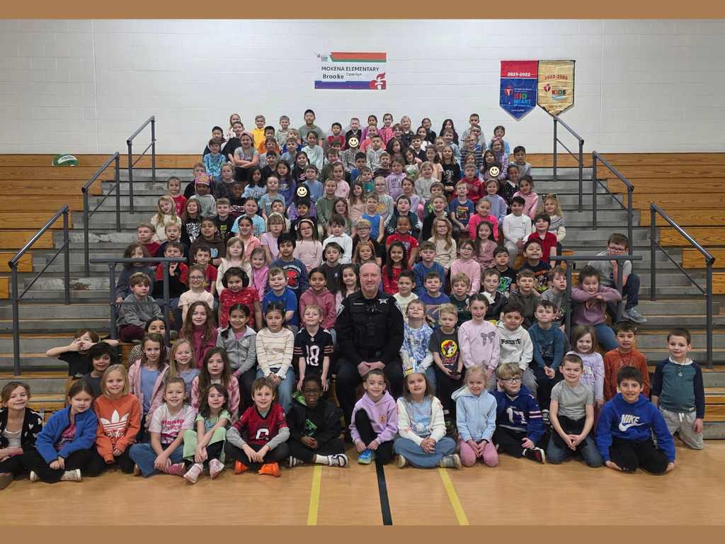 all 1st grade students with officer tom