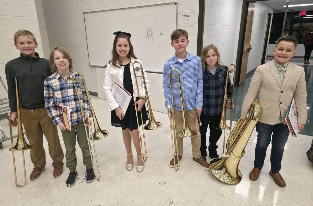 bands and orchestra concert with musicians playing instrument