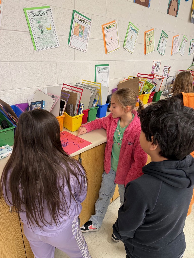 advanced learners showing posters