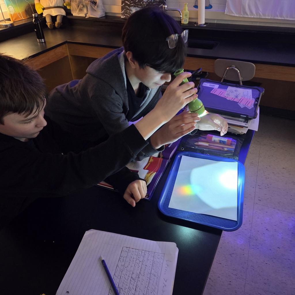 7th grade students investigating light waves